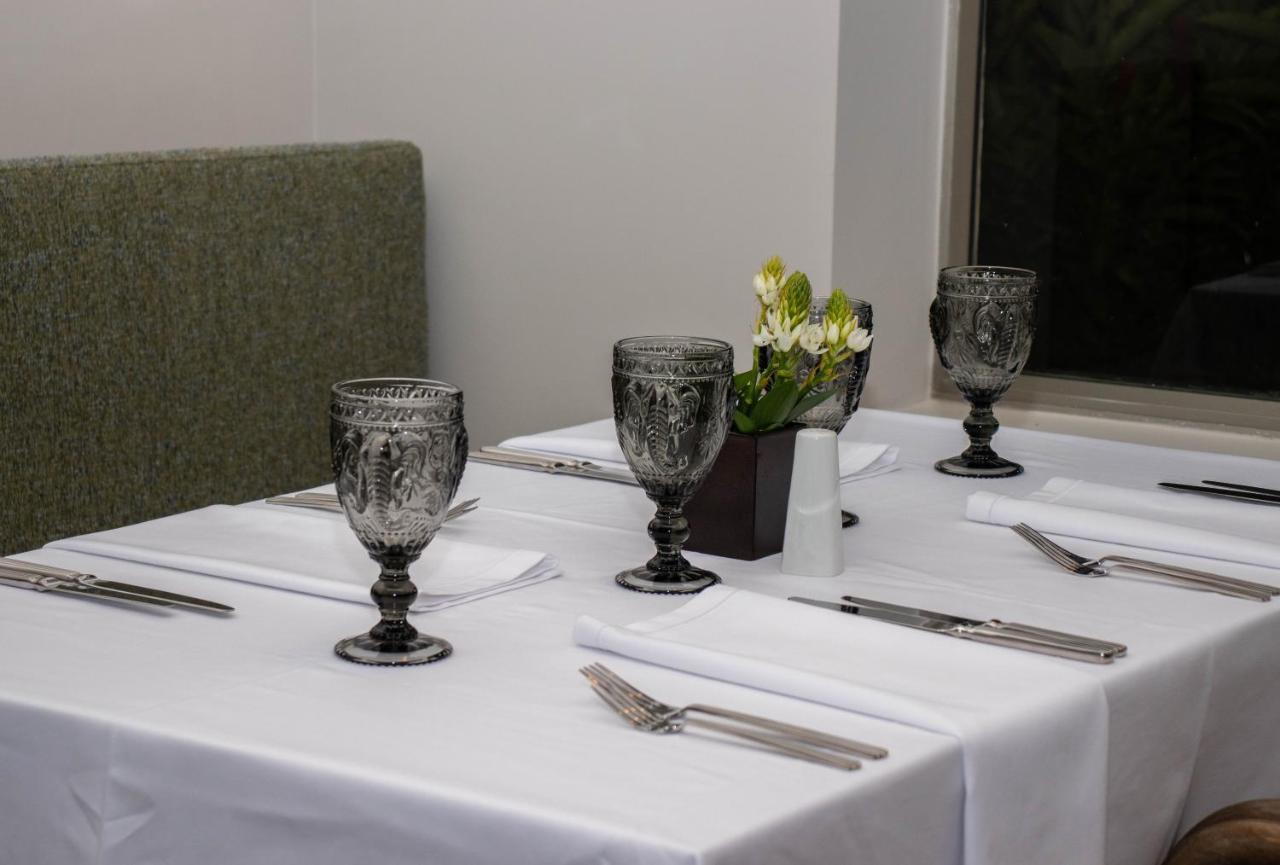 Hotel Estelar Altamira Ibagué Exteriér fotografie A table set for a meal